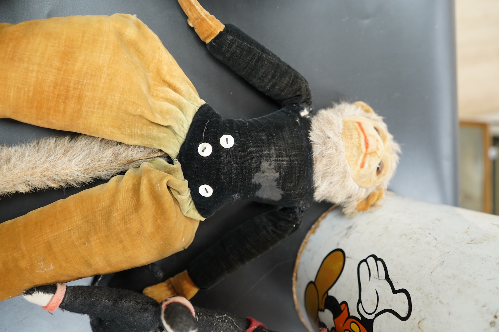 Two Nora Welling monkey soft toys, largest 38cm long and another felt made monkey together with a miniature Windsor chair and Disney Micky Mouse metal waste bin